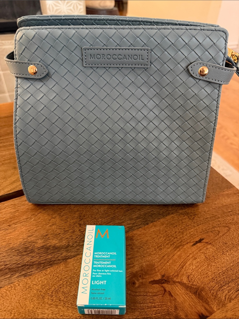 Moroccanoil Light Blue Woven Cosmetic Case with Morrocan oil treatment .85 oz